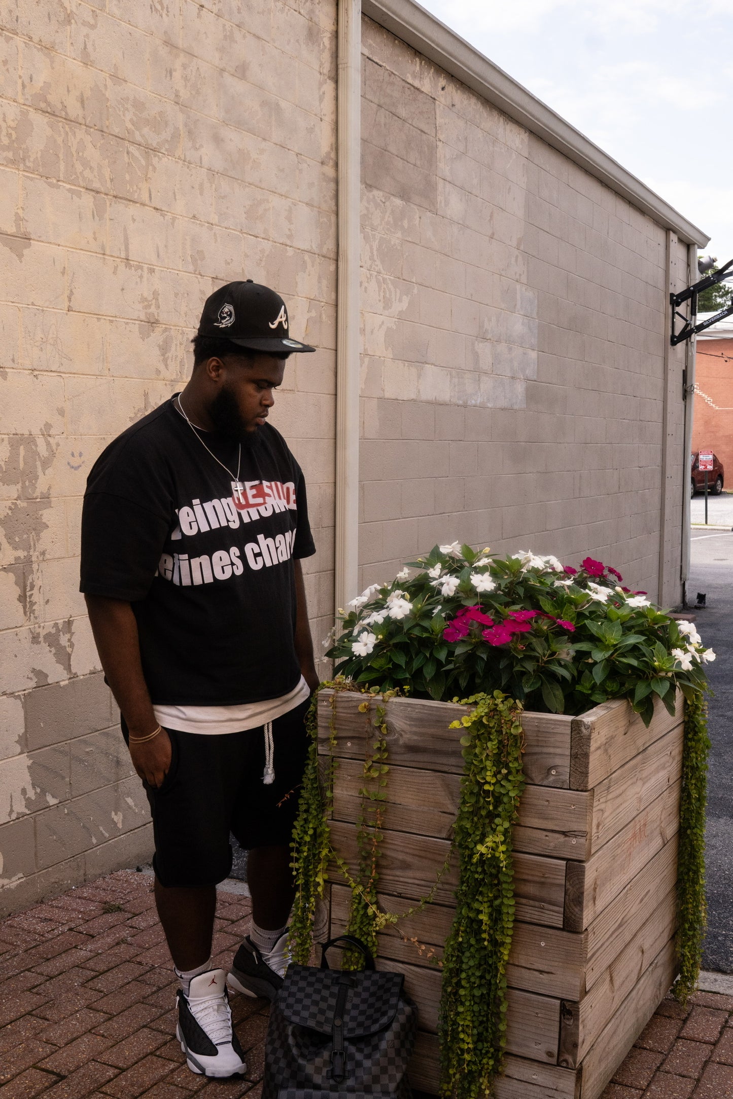 Black "Being Resilient Defines Character" Tee